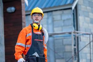 Contractor working at construction site photo