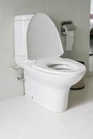 Toilet seat in bathroom photo