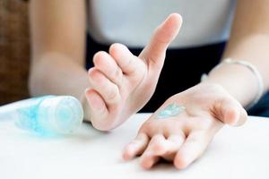 Hand sanitizer on hands photo