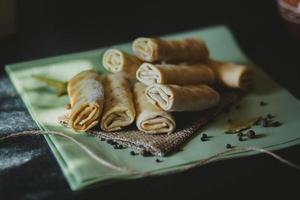 Spring rolls on fabric photo