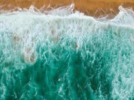 Waves crash shore photo