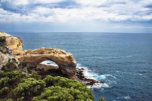 Rock formations by the ocean photo