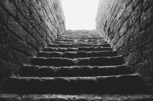 Brick stairs under bright light photo