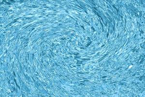 Ripples twirl water surface photo