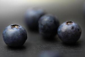 Four single blueberries  photo