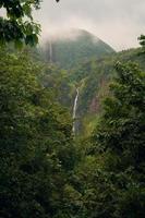 Waterfalls in mountain photo