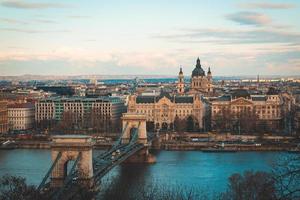 Brown concrete bridge over river photo