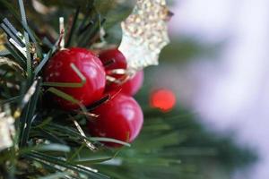 Three round red fruit ornaments  photo