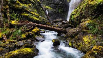 Waterfall river between rocks photo