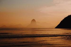 Rocky coast at dusk photo