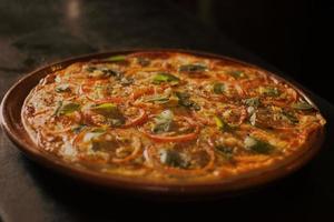 Close-up of pizza with bell pepper topping photo