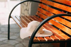 Sun hat on bench photo