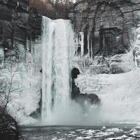 Winter cliff side waterfall photo