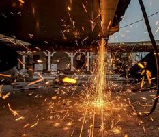 Welding sparks fly photo