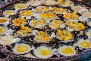 Fried egg with mussels  photo