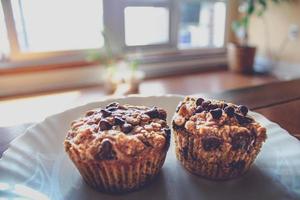 Close-up of chocolate chip muffins on plate photo