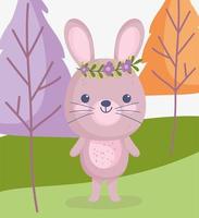 Little rabbit wearing a flower crown outdoors vector