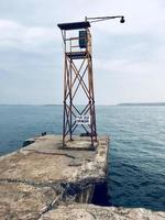 Watch tower with near body of water photo