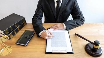 Male lawyer working on a documents  photo