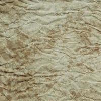 Heavily wrinkled brown paper texture and background photo