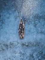 Aerial of people in boats on water photo