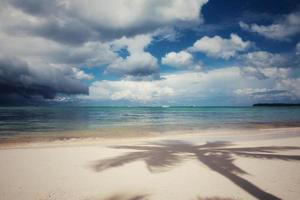 Storm clouds over beach photo