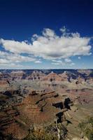 Brown mountains under blue sky photo