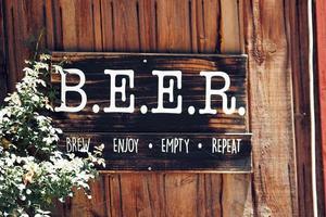 Wooden text signage saying beer photo