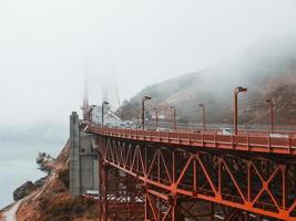 Foggy view of golden gate bridge photo