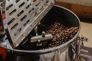 Close-up of coffee beans in roaster photo