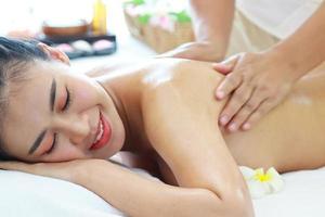 Woman getting back massage  photo