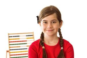 Cute little girl with an abacus photo