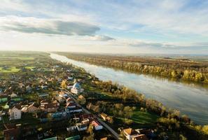 Aerial view of city and river photo