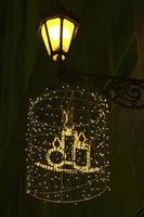 Christmas decoration on house wall with candles photo
