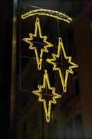 Christmas decoration on house wall with electric stars photo
