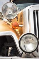 Color detail on the headlight of a vintage car photo