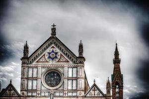 Santa Croce front view under a dramatic gray sky photo