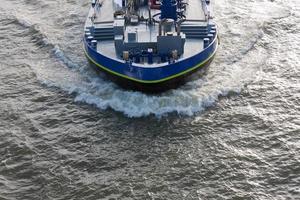 Aerial view bow wave of a cargo ship