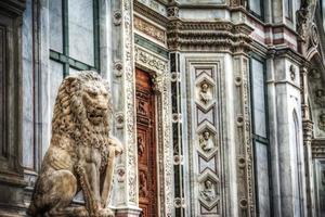 sculpture of a lion in Santa Croce square in Florence