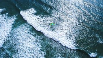 Aerial photo of person kitesurfing