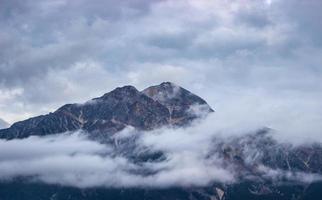 Mountain covered with clouds photo