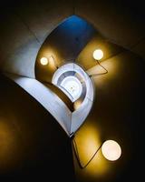 Spiral staircase with lamps photo