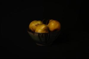 Still life of pears in ceramic bowl
