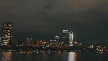 High rise buildings beside sea photo