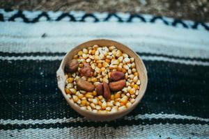 Bowl of corn and nuts photo