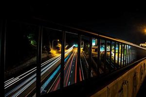 Time lapse traffic on highway photo