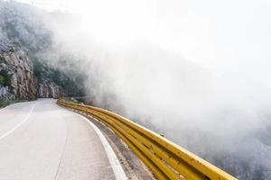 Photography of highway with fog photo