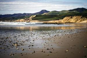 Pebbles on seashore photo