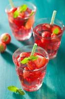 summer strawberry lemonade with lime and mint photo
