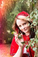Little Red Riding Hood in the forest photo